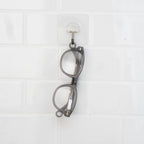 Close-up of the utility loop on Stone Gray Showerspecs reading glasses.