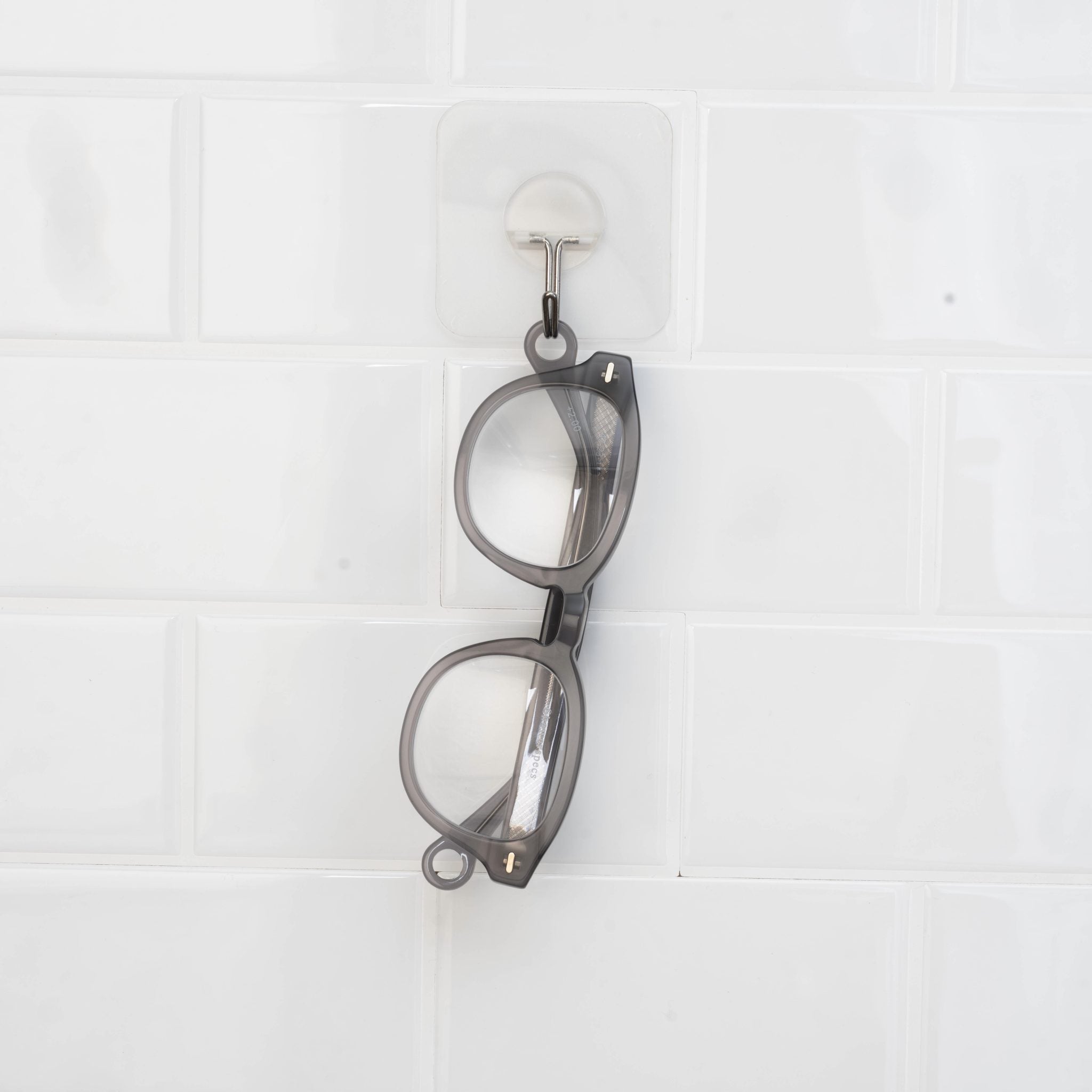 Close-up of the utility loop on Stone Gray Showerspecs reading glasses.
