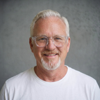 A man wearing Crystal Clear Showerspecs.