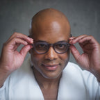 A man wearing Stone Gray Showerspecs. 