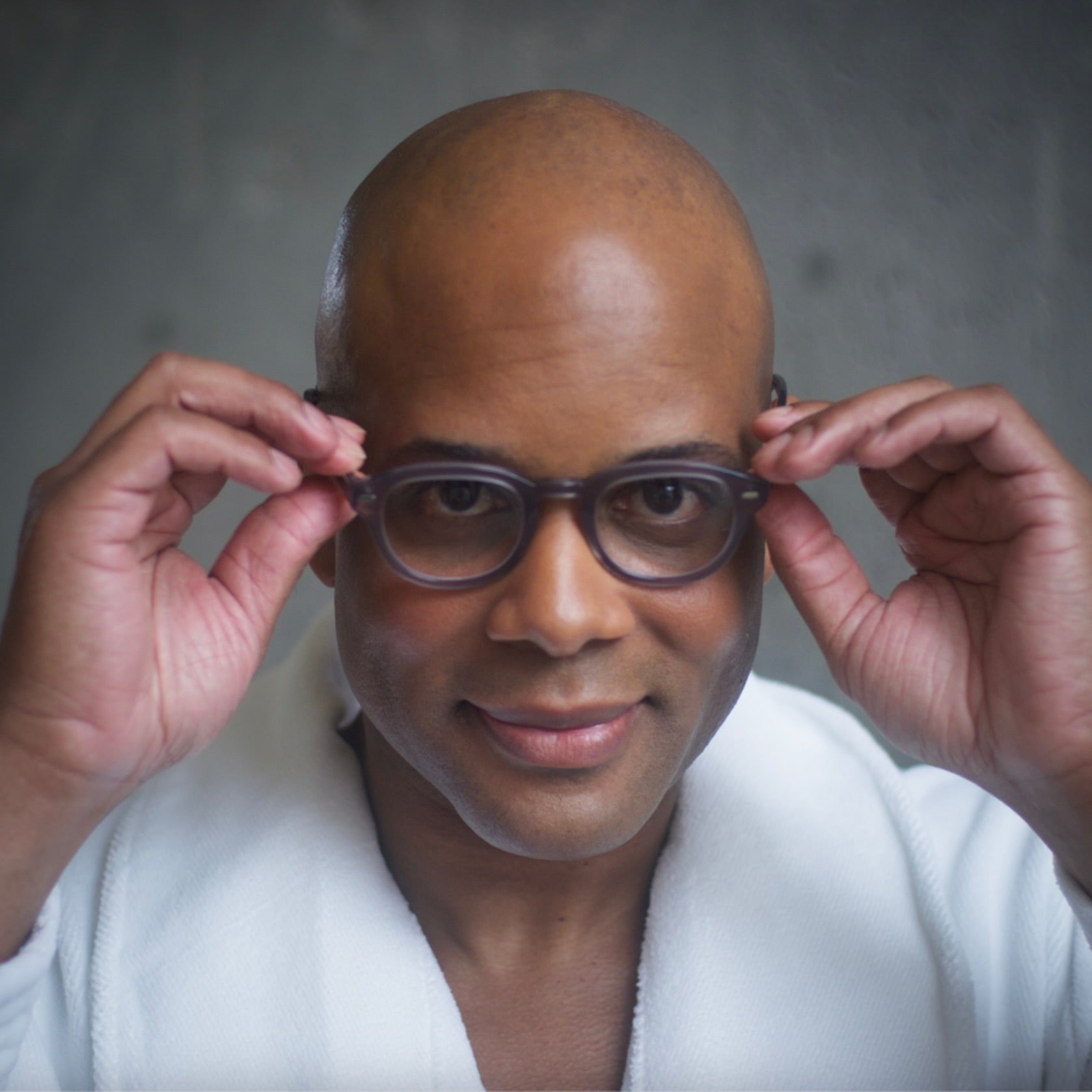 A man wearing Stone Gray Showerspecs. 