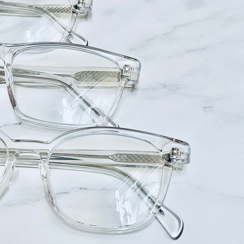 Close-up of clear Showerspecs anti-fog reading glasses.