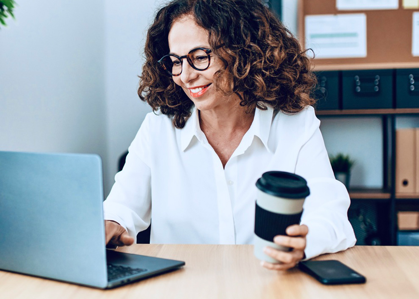Woman working on computer with fog-free glasses